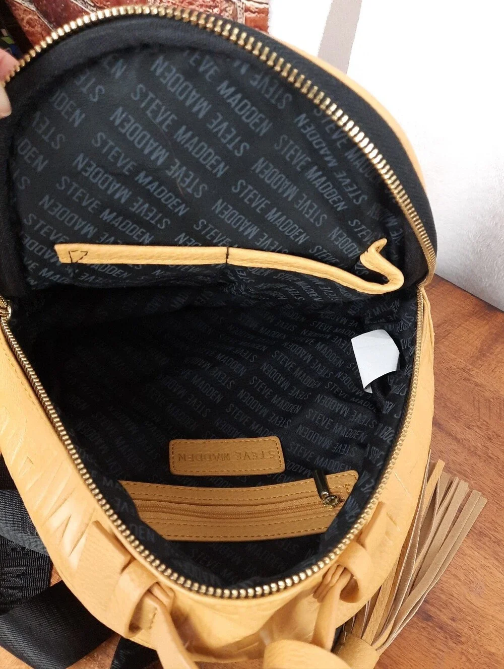 Steve Madden Mustard Mini Tassel Backpack